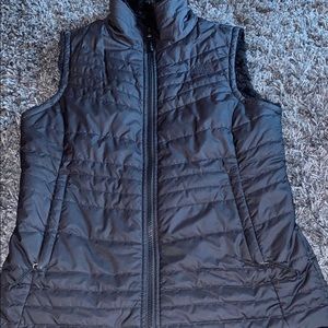 Women’s reversible North Face vest